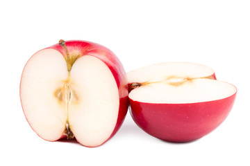 Red apples on a white background. Sliced apple.