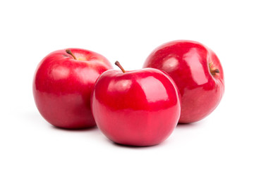 Red apples on a white background