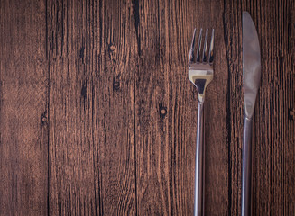 Table set for a romantic dinner with candles. Top view