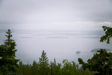 Fototapeta na wymiar A beautiful panorama of lake and forest from Koli National park peaks