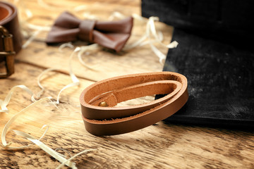 Closeup of luxury men outfits on wooden background