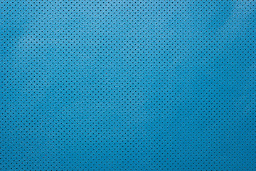 Fototapeta na wymiar Blue perforated leather background