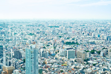 Fototapeta na wymiar Asia Business concept for real estate and corporate construction - panoramic modern cityscape building bird eye aerial view under sunrise and morning blue bright sky in Tokyo, Japan