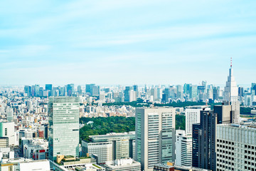 Fototapeta na wymiar Asia Business concept for real estate and corporate construction - panoramic modern cityscape building bird eye aerial view under sunrise and morning blue bright sky in Tokyo, Japan