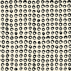 Seamless pattern with small circles hand painted with black ink. Abstract monochrome background, texture in retro style. Vintage vector illustration for wrapping paper, wallpaper, fabric print.