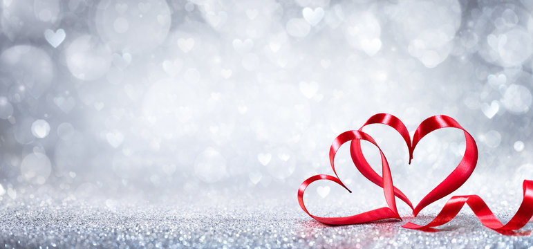 Valentines Day Decoration - Ribbon Shaped Hearts On Shiny Background
