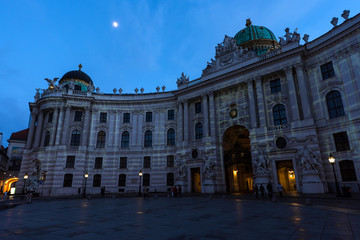 Famous hofburg palace in vienna in the evening, seen from michaelerplatz, austria