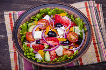 Fresh vegetable greek salad on the table