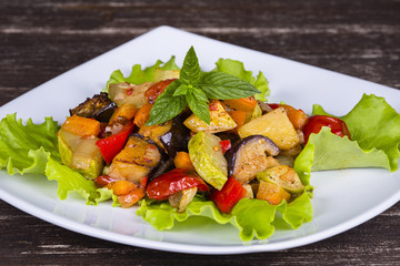 Vegetable stew in plate, close up.