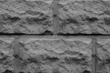 Wall fragment with attritions and cracks