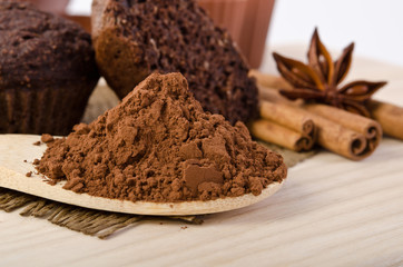 cinnamon stick, star of anise, cocoa powder and chocolate muffi