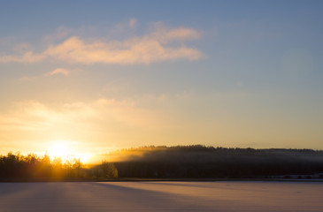 Fototapeta na wymiar Beautiful and colorful sunrise in Finland. 