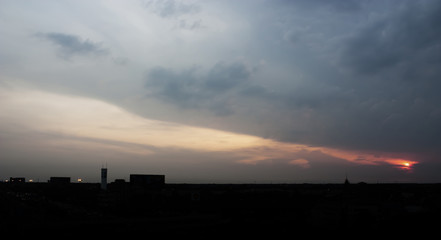 Naklejka premium Panorama view of Sunset sky and Silhouette Background.