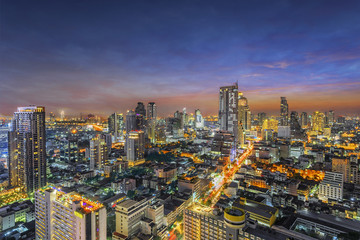 Fototapeta na wymiar Aerial view of Bangkok modern office buildings, condominium, living place in Bangkok city downtown with sunset scenery, Bangkok , Thailand