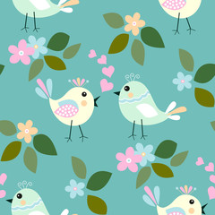 Cute birds seamless pattern with little flower and leaf on a blue background.