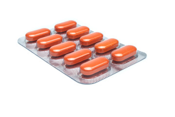 таблетки на белом фоне,капсула в пластине,