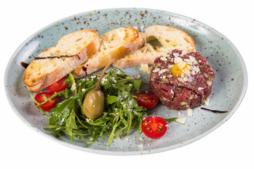 appetizer of veal on white