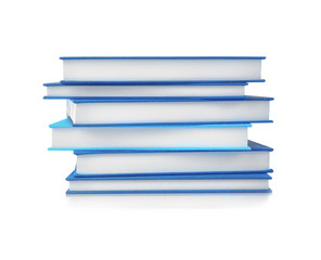 Stack of books on white background