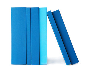 Set of books in row on white background