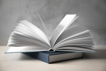 Open book on light background