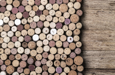 Wine corks on rustic wooden