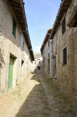 Alleway with stone houses in Candelario, Spain