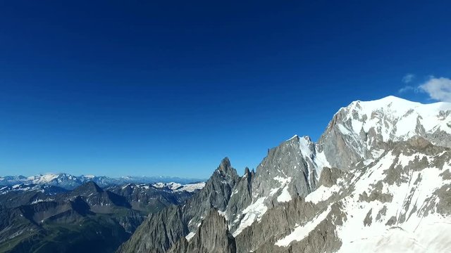 Panoramic view of Western alps whith Mount Blanc and Giant's Tooth (Dent du Geant) from Helbronner roof of europe in Aosta Valley region of Italy
