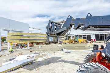 Telescopic forklift at the building site