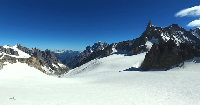 Panoramic view of Western alps whith Mount Blanc and Giant's Tooth (Dent du Geant) from Helbronner roof of europe in Aosta Valley region of Italy