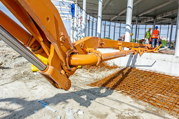 Detail of mechanical joint at crane's arm. Concrete transport ov
