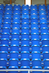 Fototapeta premium Colorful of stadium seats in background.