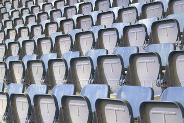 Fototapeta premium Colorful of stadium seats in background.