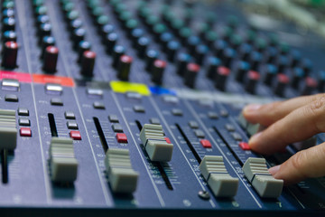 selective focus finger tuning of sound mixer close up studio