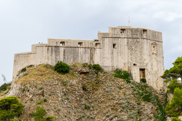 Fototapeta premium Medieval castle over the rocks in the old city of Dubrovnik, Croatia