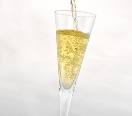 White Wine Poured into Wine Glass