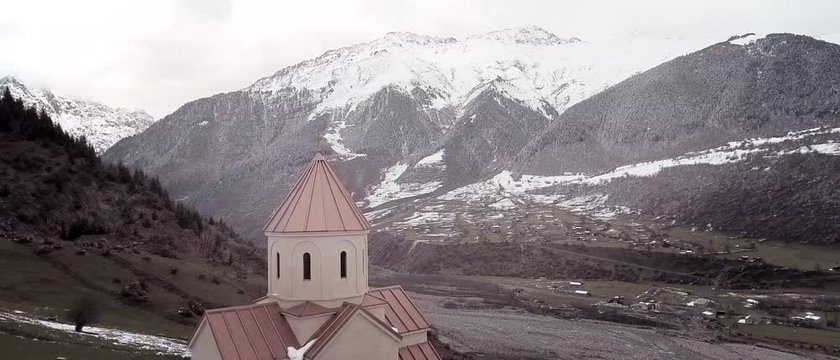 Aerial view from DJI Phantom on a Kavkaz church in mountains in Georgia.