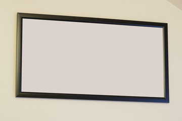 Empty frame from a picture, document, diploma or commendation on a wall