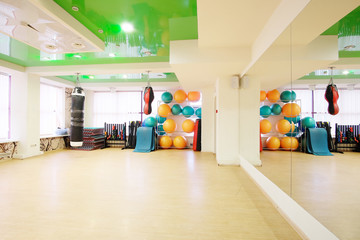 Interior of a fitness hall with punching bags