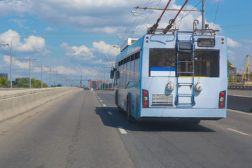 Fototapeta na wymiar trolley moves along city street