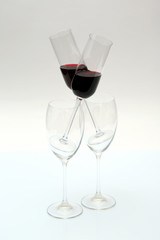 glasses with red wine on a light background