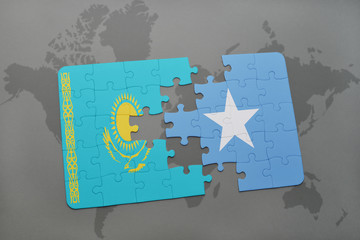 puzzle with the national flag of kazakhstan and somalia on a world map