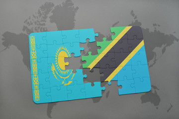 puzzle with the national flag of kazakhstan and tanzania on a world map