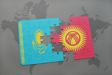 puzzle with the national flag of kazakhstan and kyrgyzstan on a world map
