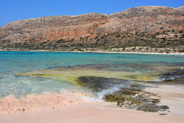 Pink sand of amazing Balos lagoon. Crete, Greece
