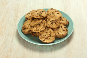 Chocolate chips cookies on plate with copyspace