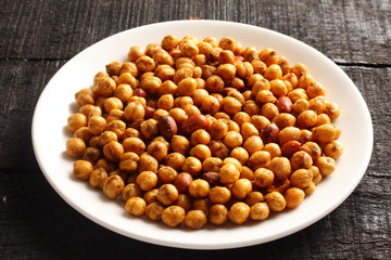 Traditional Indian snack masala chicpes coated with spices