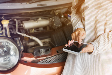 hand press on mobile or smartphone,car broken down background