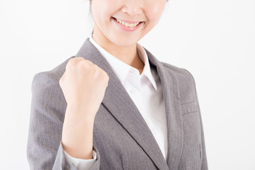 ガッツポーズをする女性、やる気、元気、根性