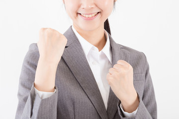 ガッツポーズをする女性、やる気、元気、根性