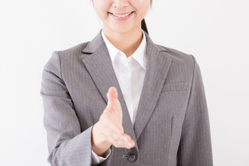 握手をする女性、協力、友好、信頼、対等